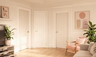 After painting view of a warm white living room with crisp trim in Kingston